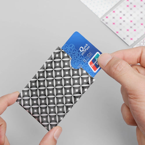 Patterned RFID blocking card sleeve with a contactless card — image 1